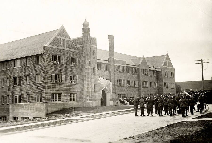 1923-06-11 photograph of Forney Hall. View of military band on the way to the dedication. [PG1_60-12]