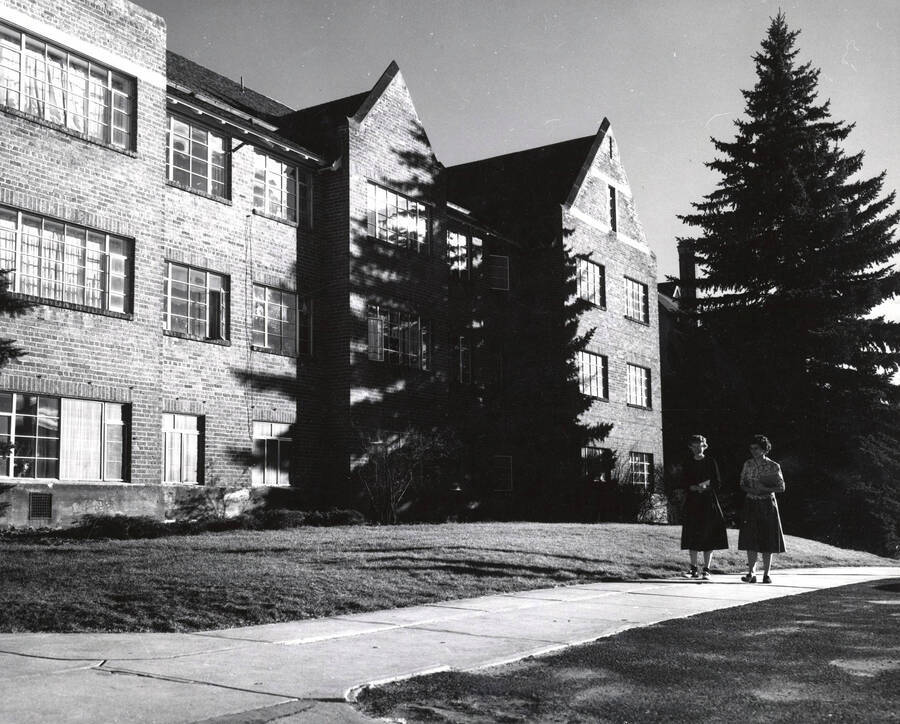 1940 photograph of Forney Hall. View of students walking to class. Donor: Publications Dept. [PG1_60-22]