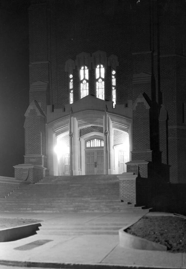 1940 photograph of Memorial Gymnasium. View at night of the entrance. [PG1_61-44]