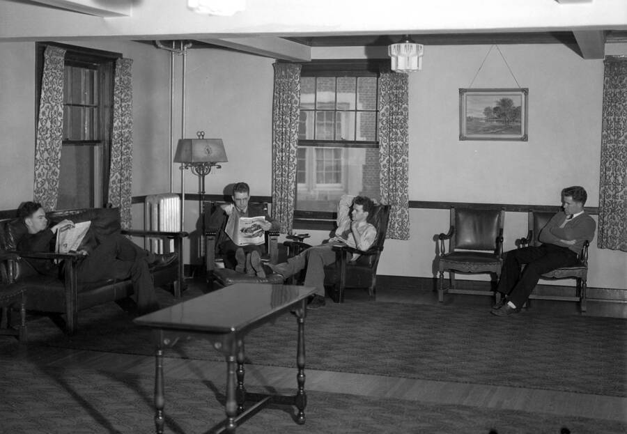1935 photograph of Lindley Hall. View of the men in their living room. [PG1_62-16]