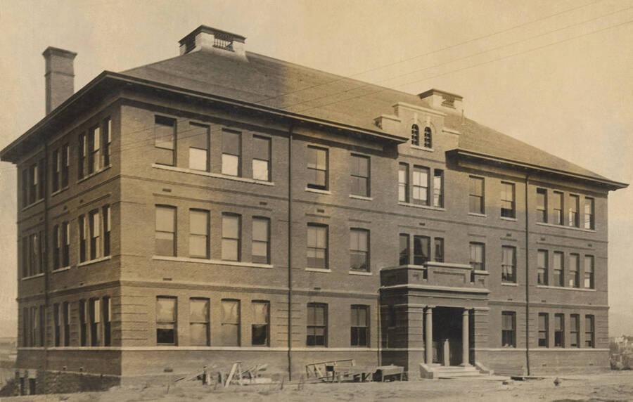 1906 photograph of Morrill Hall with construction debris out front. [PG1_66-01]