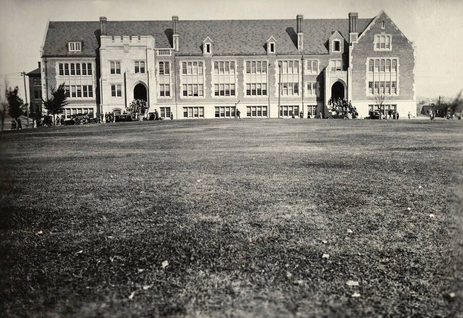 1925 photograph of Science Hall Renamed Life Sciences Building in 1964. View of students at the building entrances. [PG1_067-22]