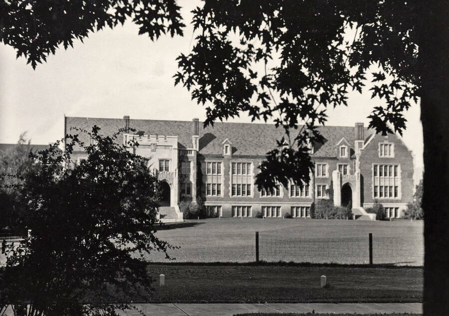 1930 photograph of Science Hall Renamed Life Sciences Building in 1964. View from across the lawn seen through the trees. [PG1_067-31]
