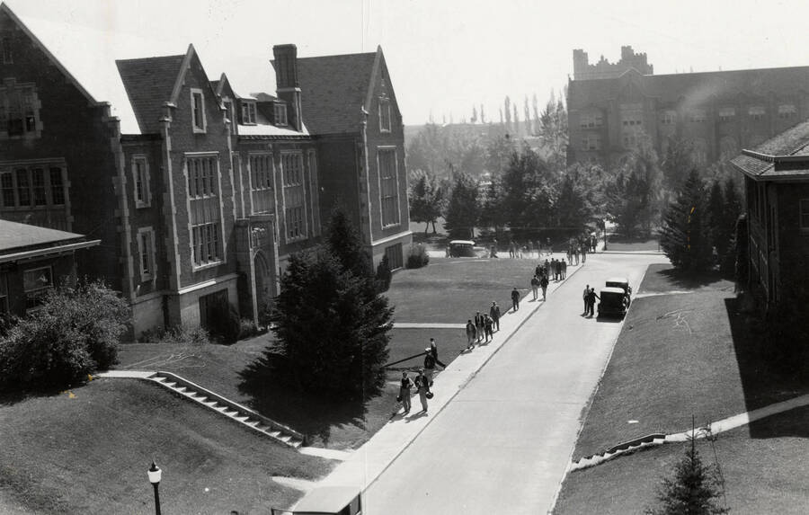 1936 photograph of Science Hall Renamed Life Sciences Building in 1964. View of students walking to class. Donor: Publications Dept. [PG1_067-43]