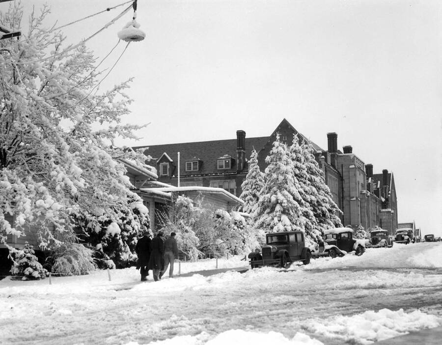 1935 photograph of Science Hall Renamed Life Sciences Building in 1964. Winter scene includes students and automobiles.[PG1_067-57]