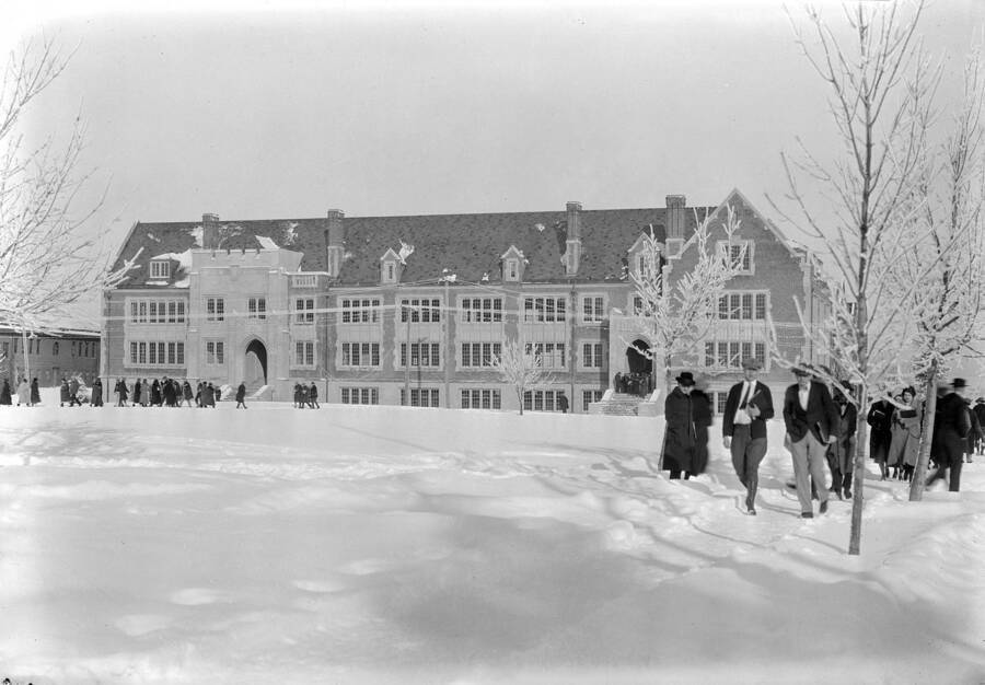 1929 photograph of Science Hall Renamed Life Sciences Building in 1964. View of students walking to class in the winter. [PG1_067-62]