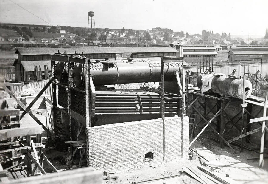 1927 photograph of Heating Plant. View of the construction with Moscow in the background. [PG1_070-02]