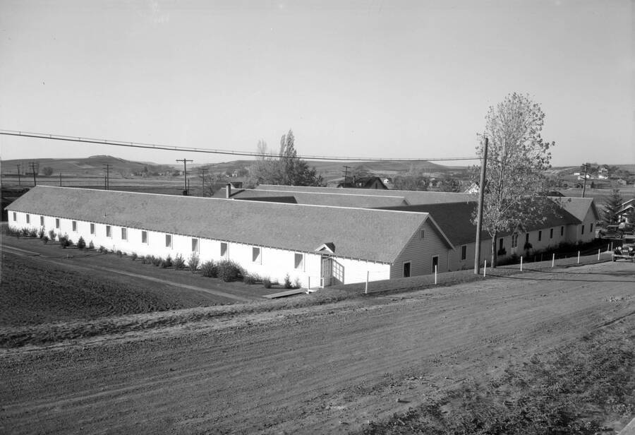 1936 photograph of Idaho Club. View from the street, farms in the background. [PG1_071-06]
