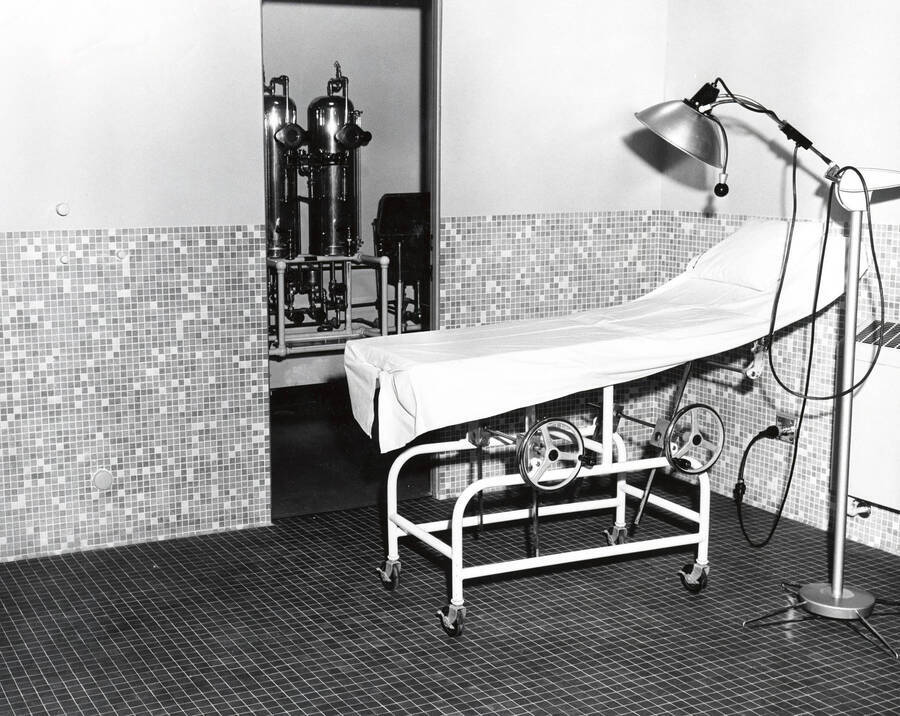 1960 photograph of Infirmary. View of the examination room. Donor: Publications Dept. [PG1_074-25]
