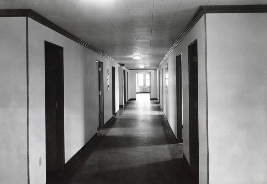 1937 photograph of Infirmary. View of the corridor. [PG1_074-06]