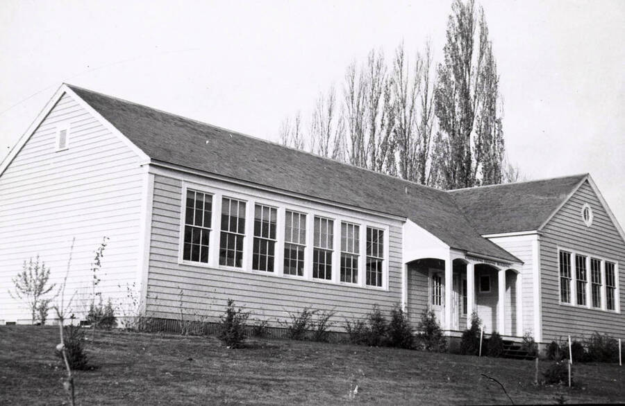 1936 photograph of Industrial Arts Building. Poplars visible in the background. [PG1_080-2]
