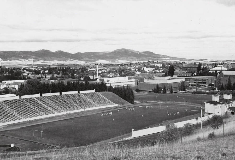 1960 photograph of Neale Stadium. View of football practice. [PG1_085-14]