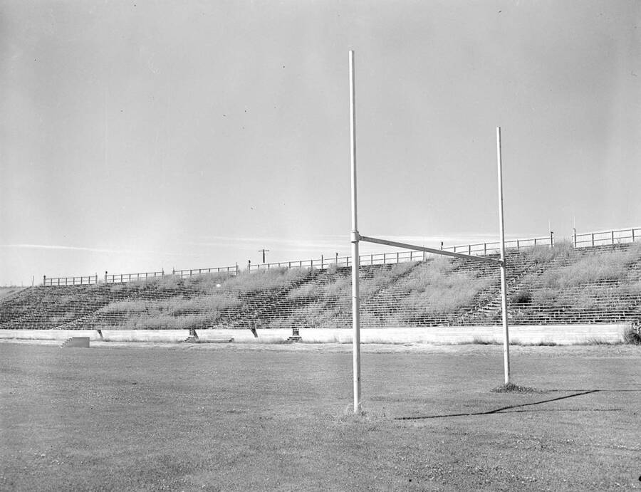 1940 photograph of Neale Stadium. Weeds grow through bleachers. [PG1_085-16]
