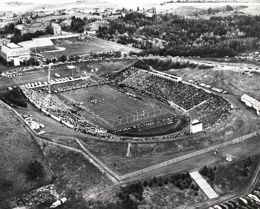 1940 photograph of Neale Stadium. Aerial view shows the grandstands full of fans at the football game. [PG1_085-09]