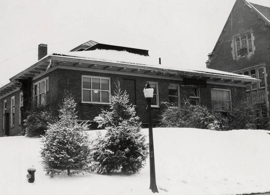 1923 photograph of Geology Building. View of the snow. [PG1_086-04]