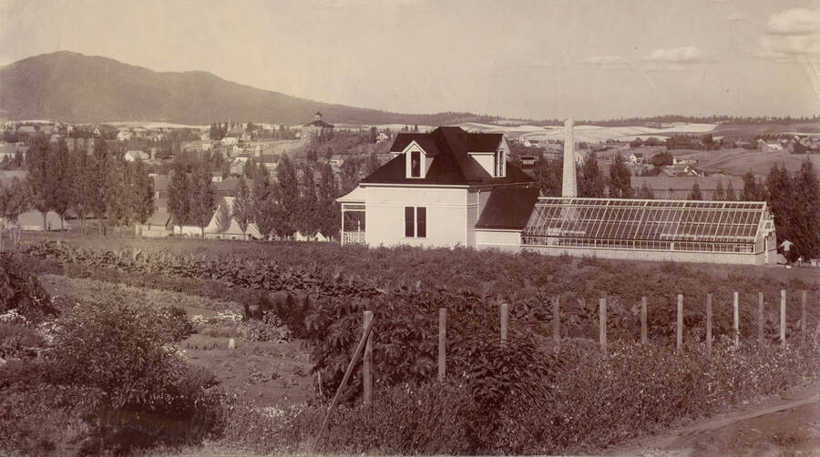 1900 photograph of Horticulture Building. View of Moscow Mountain in the background on the left. Donor: W.C. Edmundson. [PG1_094-11]
