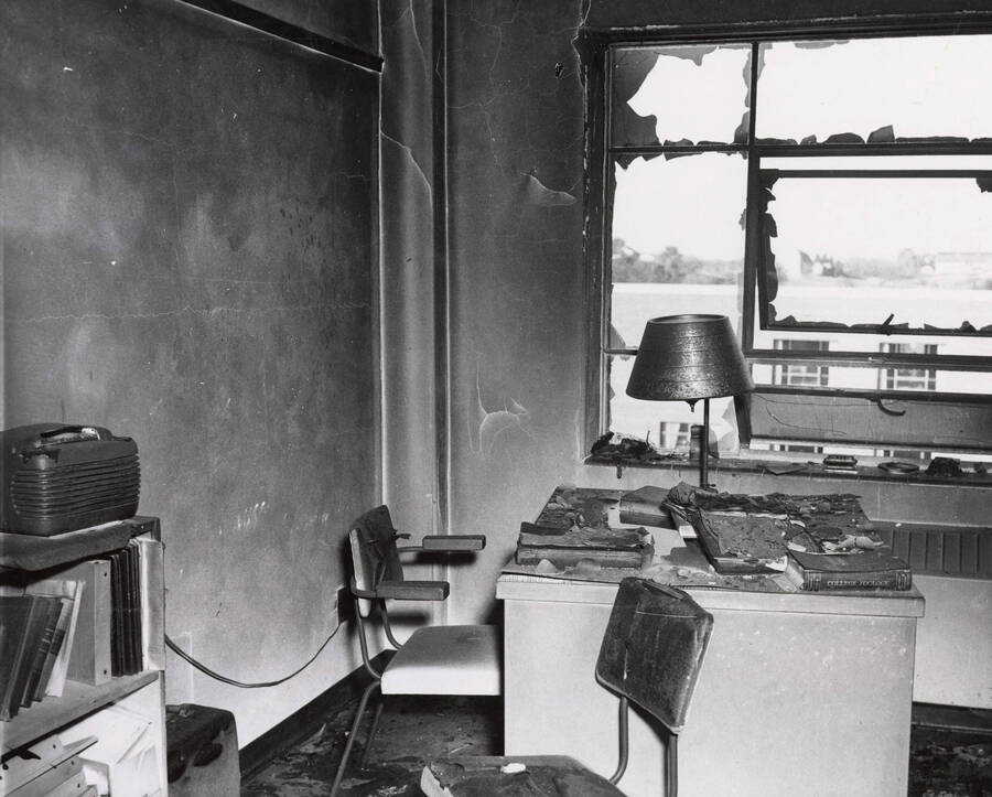 1956 photograph of Gault Hall. Interior of a study room after a fire. [PG1_095-01]