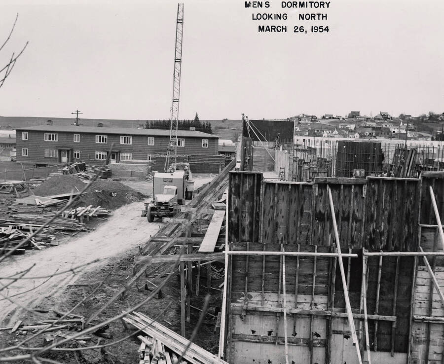 March 26, 1954 photograph of Gault Hall under construction. Construction equipment present. [PG1_095-13a]