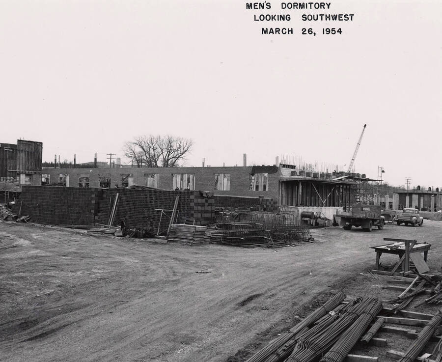 March 26, 1954 photograph of Gault Hall under construction. Crane in the background. [PG1_095-13d]