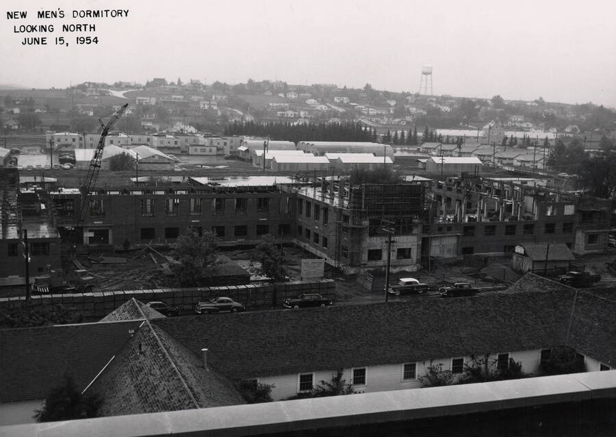 June 15, 1954 photograph of Gault Hall under construction. Watertower in the background. [PG1_095-16b]