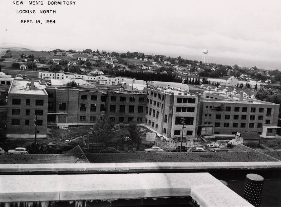 September 15, 1954 photograph of Gault Hall under construction. Water tower in the background. [PG1_095-19a]
