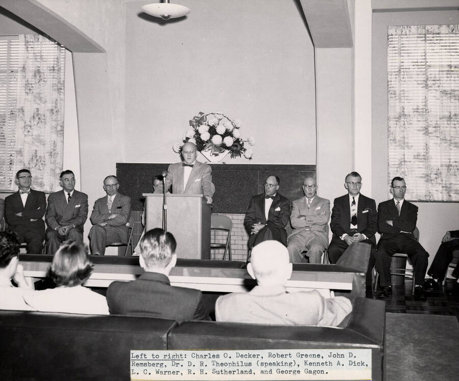 1955 photograph of dedication of Gault Hall. Left to right: Charles O. Decker, Robert Greene, John D. Remsberg, D. R. Theophilus, Kenneth A. Dick, L.C. Warner, R.H. Sutherland, and George Gagon. [PG1_095-04]