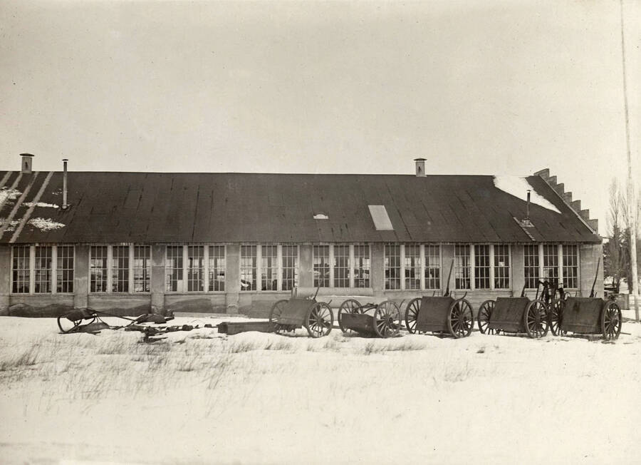1924 photograph of the Engineering laboratories. Snow covers the scene. [PG1_096-03c]