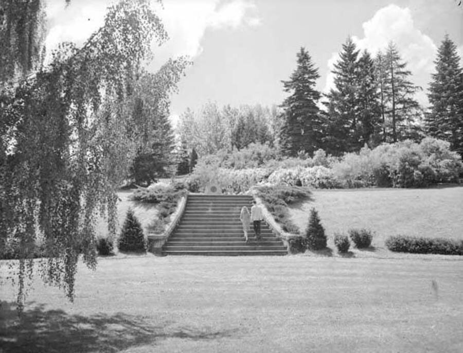 1950 photograph of the Memorial Steps. Two students in foreground. [PG1_097-14]