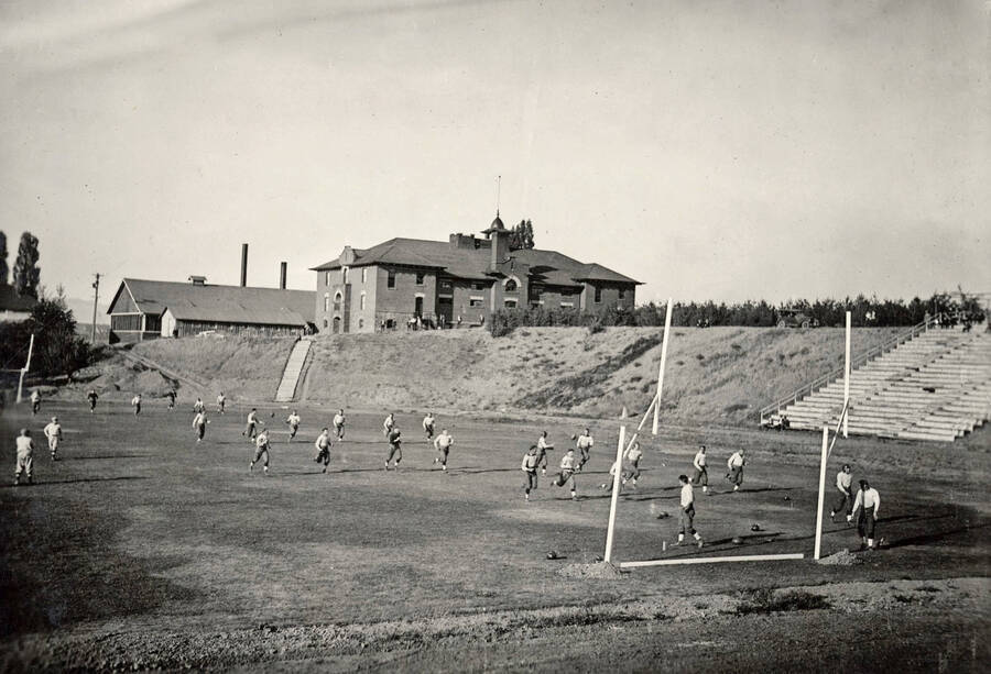 1922 photograph of MacLean Field. Student athletes on field. [PG1_098-03]