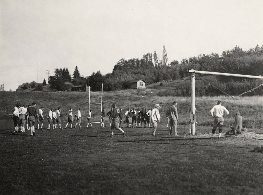 1923 photograph of MacLean Field. Charlie Erb and Stew Beam coaching students. [PG1_098-04]