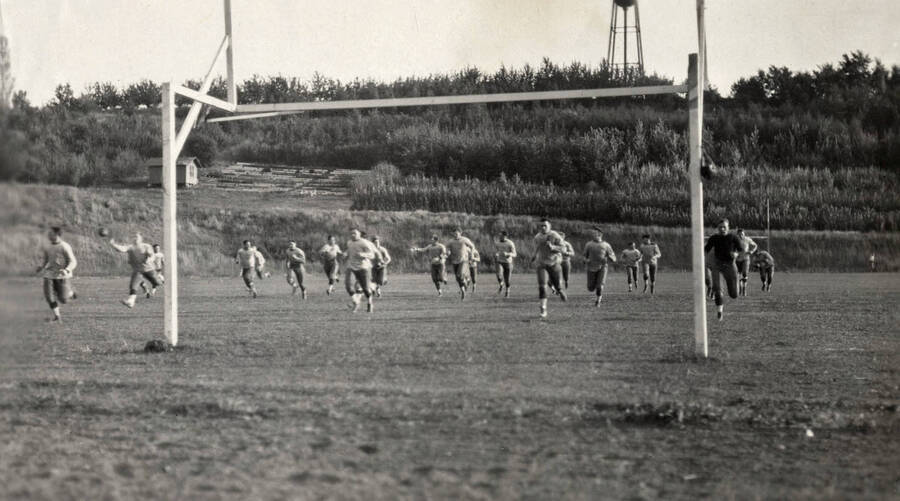 1923 photograph of MacLean Field. Student athletes on field. [PG1_098-05]