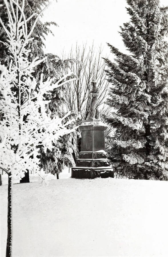 1924 photograph of Spanish American War Memorial. Snow covers the scene. [PG1_099-01]