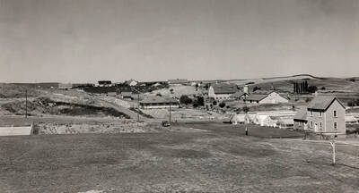 1933 panoramic photograph of University farms. Tennis courts are to the left.