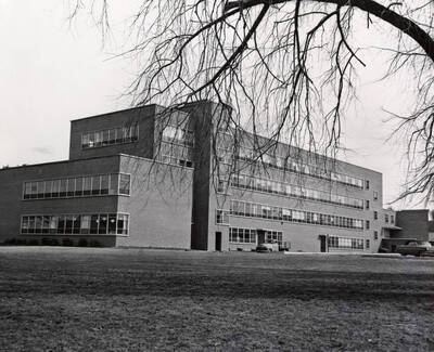 1955 photograph of Agricultural Science Building. Tree in foreground. Donor: Publications Dept..