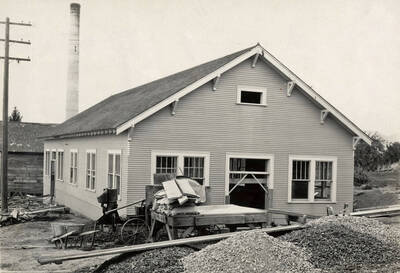 1950 photograph of the Radio-Isotopes Laboratory. Steam tower in the background.