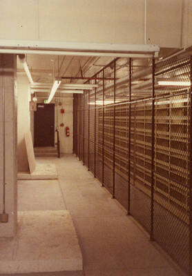 December 15, 1988 photograph of the Library. Compact shelving in basement. Donor: Monte Steiger.
