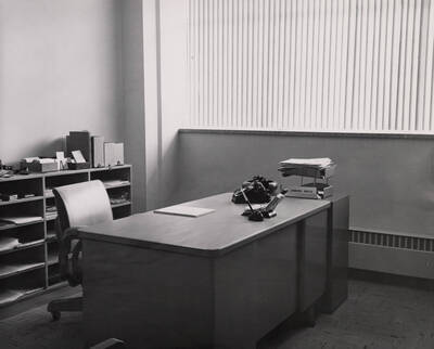 1957 photograph of the Library. Office of library assistant.