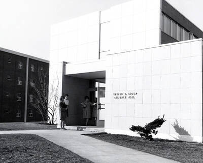 1961 photograph of Shoup Hall. Students in entrance. Donor: Publications Dept.