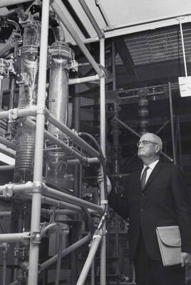1969 photograph of the Buchanan Engineering Laboratory dedication ceremony. J.E. Buchanan inspects equipment.
