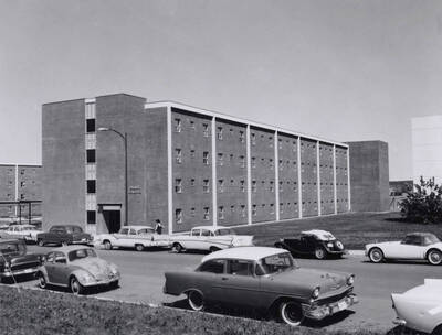1967 photograph of the Ballard Residence. Automobiles in foreground. Donor: Publications Dept..