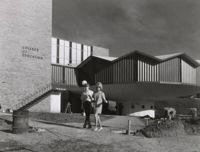 1970 photograph of the Education Building. Students in foreground.