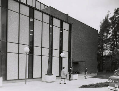 1962 photograph of the Education Building. Students in foreground.