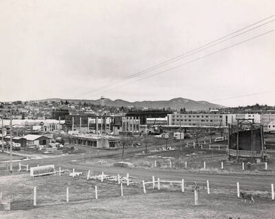1963 photograph of the Wallace Residence Center under construction. Water tower in background. Donor: Publications Dept.