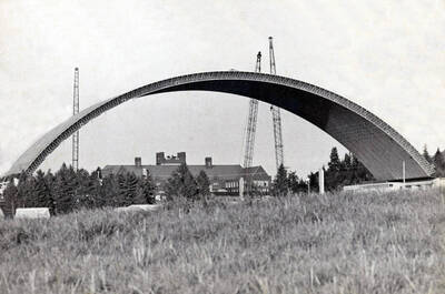 1975 photograph of the Kibbie-ASUI Activity Center under construction. Administration building in background.