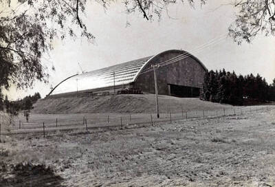 1975 photograph of the Kibbie-ASUI Activity Center under construction. View from a neighboring field.