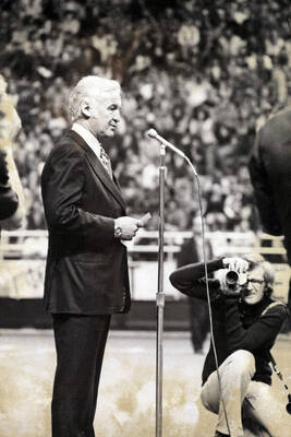 1975 photograph of the Kibbie-ASUI Activity Center dedication ceremony. William H Kibbie stands at microphone.