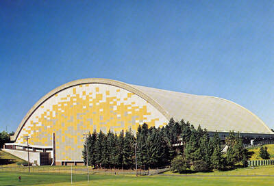 1976 photograph of the Kibbie-ASUI Activity Center. Caption reads: 'Barrel arch roof of the University of Idaho Activity Center, the Outstanding Structural Engineering Achievement. Awarded in a National Competition 1976 by the American Society of Civil Engineers.' Donor: U of I Alumni Office.