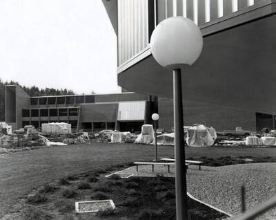 1970 photograph of the Physical Education Building under construction. Kiva in foreground. Donor: Publications Dept.