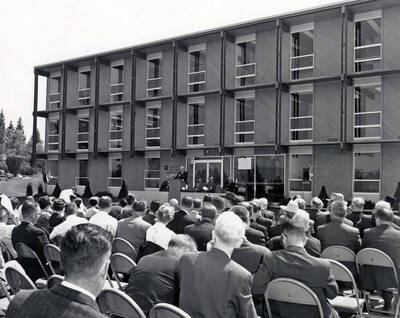 1963 photograph of the Forestry Sciences Laboratory dedication ceremony. A large audience in foreground. Donor: Publications Dept.