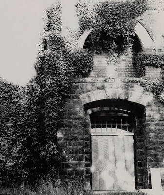 March 15. 1975 photograph of Art and Architecture South. View of basement doorway, west elevation. Donor: Karl Roenke.